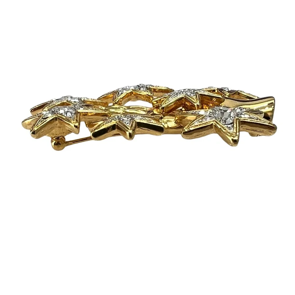 NOLAN MILLER SHINY GOLDEN HAND WITH CRYSTAL STARS BROOCH